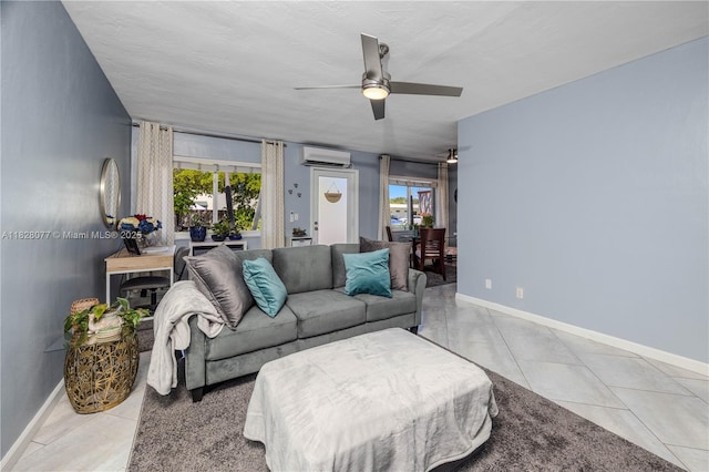 1000 SW 10th Ter Unit 2P, Hallandale Beach, FL 33009 - living room with a wall unit AC, light tile patterned floors, a ceiling fan, and plenty of natural light