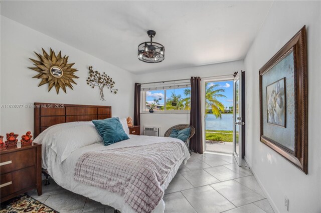 1000 SW 10th Ter Unit 2P, Hallandale Beach, FL 33009 - bedroom featuring access to exterior, a water view, and light tile patterned flooring