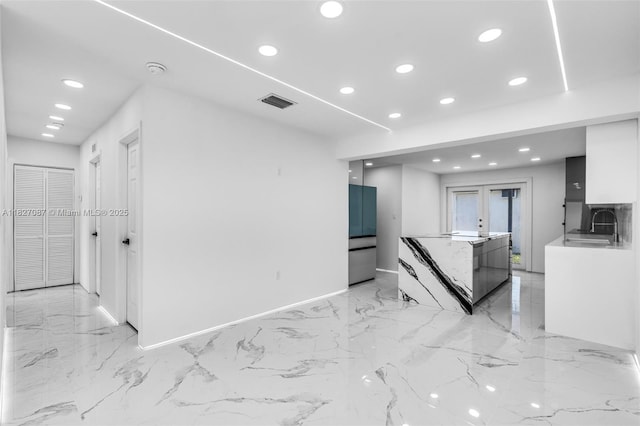 770 SE 5th Pl, Hialeah, FL 33010 - living area with recessed lighting and light marble finish floors