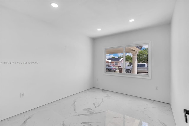 770 SE 5th Pl, Hialeah, FL 33010 - unfurnished room featuring recessed lighting and marble finish flooring
