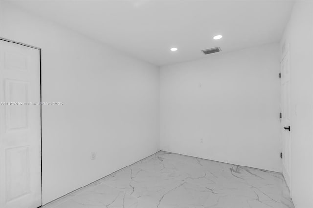 770 SE 5th Pl, Hialeah, FL 33010 - unfurnished room featuring light marble finish flooring and recessed lighting
