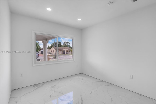 770 SE 5th Pl, Hialeah, FL 33010 - empty room with recessed lighting, light marble finish flooring, and a smoke detector