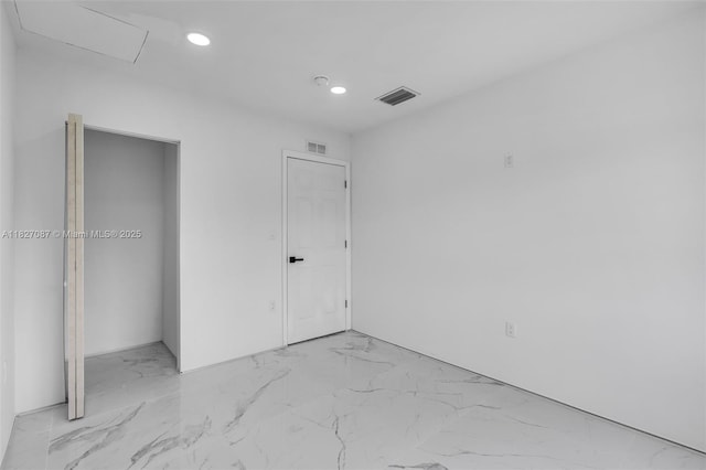 770 SE 5th Pl, Hialeah, FL 33010 - unfurnished bedroom with light marble finish flooring and recessed lighting