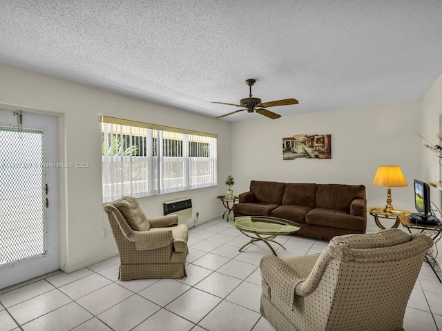 199 Durham D Unit 199, Deerfield Beach, FL 33442 - living room with light tile patterned flooring, a ceiling fan, and a textured ceiling