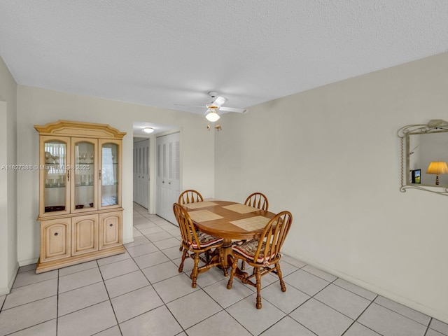 199 Durham D Unit 199, Deerfield Beach, FL 33442 - dining space with light tile patterned flooring, ceiling fan, and a textured ceiling
