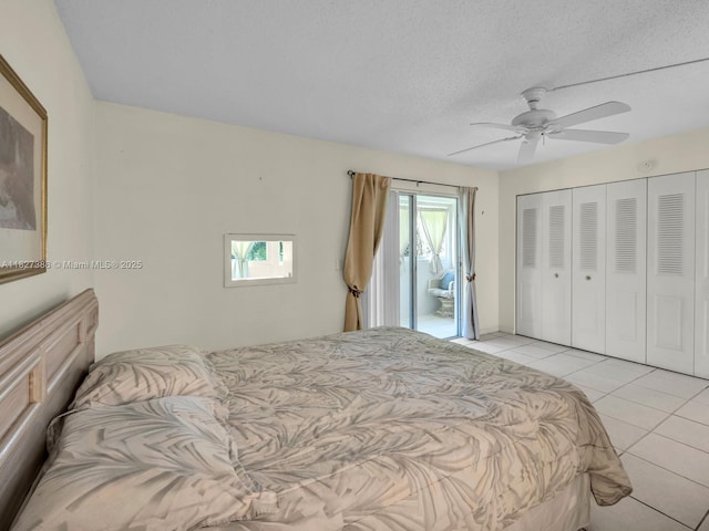 199 Durham D Unit 199, Deerfield Beach, FL 33442 - bedroom with light tile patterned floors, ceiling fan, a closet, and a textured ceiling