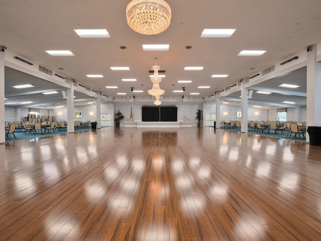 199 Durham D Unit 199, Deerfield Beach, FL 33442 - exercise area featuring a chandelier and wood-type flooring