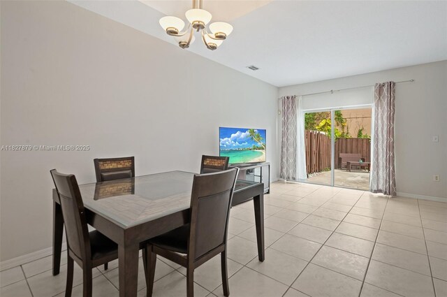 8366 NW 10th St Unit 3B, Miami, FL 33126 - dining area with a chandelier and light tile patterned flooring
