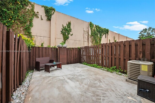 8366 NW 10th St Unit 3B, Miami, FL 33126 - fenced backyard featuring a patio
