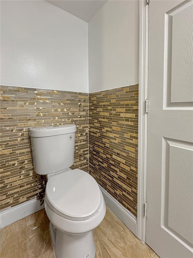 8103 SW 24th St, North Lauderdale, FL 33068 - bathroom with tile walls and a wainscoted wall