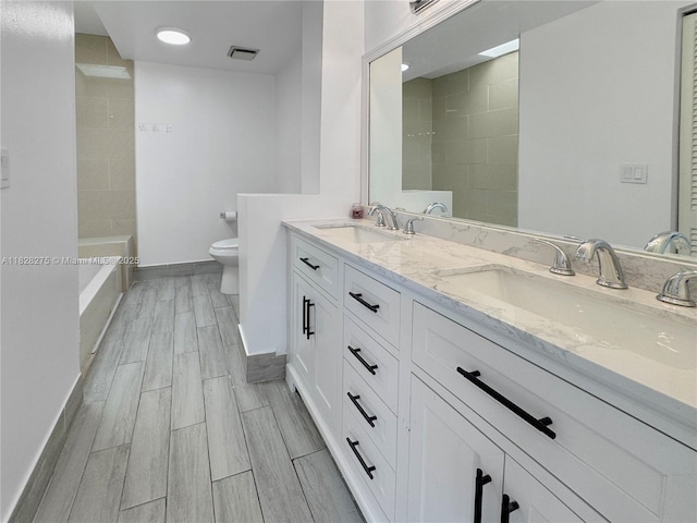 8103 SW 24th St, North Lauderdale, FL 33068 - bathroom with double vanity and wood tiled floors