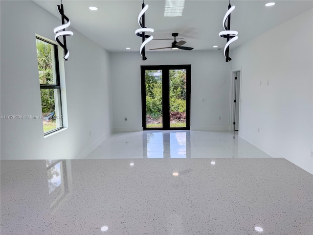505 W 10th St, Lehigh Acres, FL 33972 - spare room featuring ceiling fan and recessed lighting
