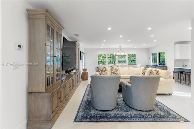 2180 Alamanda Dr, North Miami, FL 33181 - living area with recessed lighting, a chandelier, and healthy amount of natural light