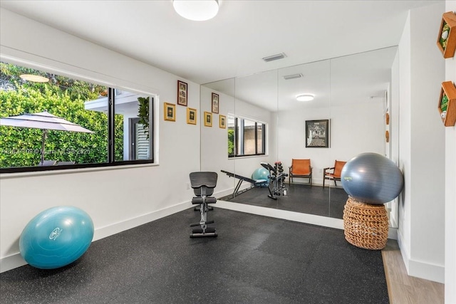 2180 Alamanda Dr, North Miami, FL 33181 - workout room featuring baseboards