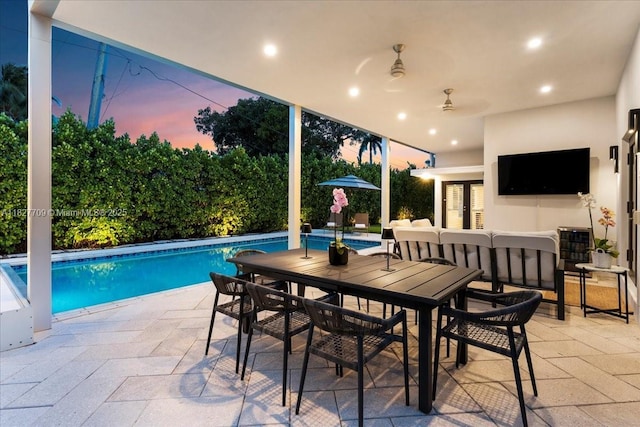 2180 Alamanda Dr, North Miami, FL 33181 - outdoor pool with a patio, outdoor dining space, french doors, and an outdoor living space