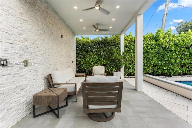 2180 Alamanda Dr, North Miami, FL 33181 - view of patio / terrace with ceiling fan and an outdoor living space