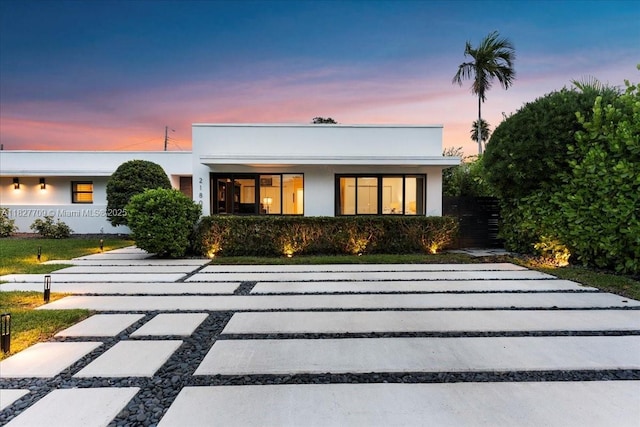 2180 Alamanda Dr, North Miami, FL 33181 - back of property featuring stucco siding