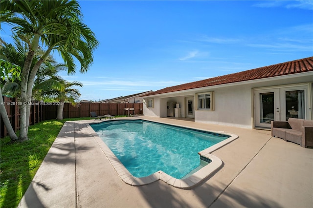 14795 SW 174th St, Miami, FL 33187 - view of pool with french doors, a fenced backyard, and a patio