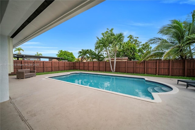 14795 SW 174th St, Miami, FL 33187 - view of swimming pool with a patio area and a fenced backyard