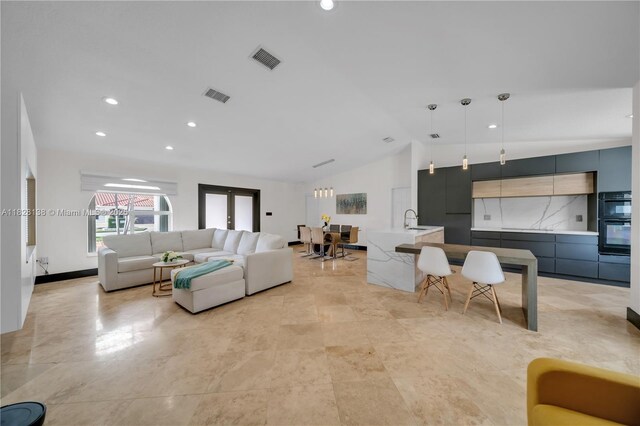 14795 SW 174th St, Miami, FL 33187 - living area featuring vaulted ceiling, french doors, and recessed lighting