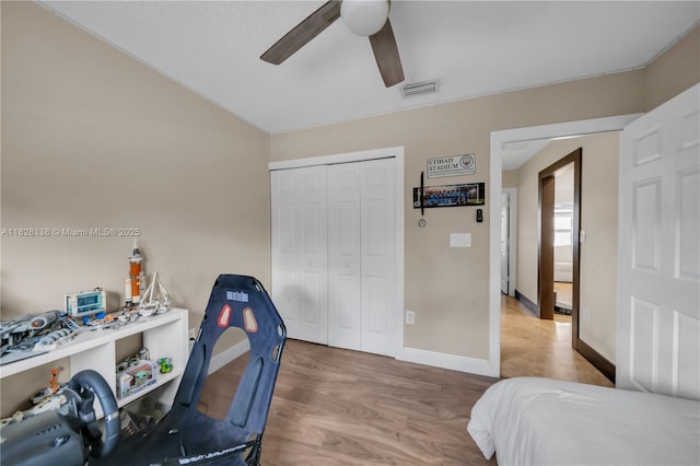 14795 SW 174th St, Miami, FL 33187 - bedroom featuring a closet, wood finished floors, and ceiling fan