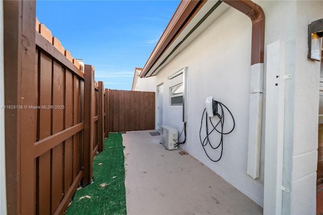 14795 SW 174th St, Miami, FL 33187 - view of side of home with a fenced backyard and stucco siding