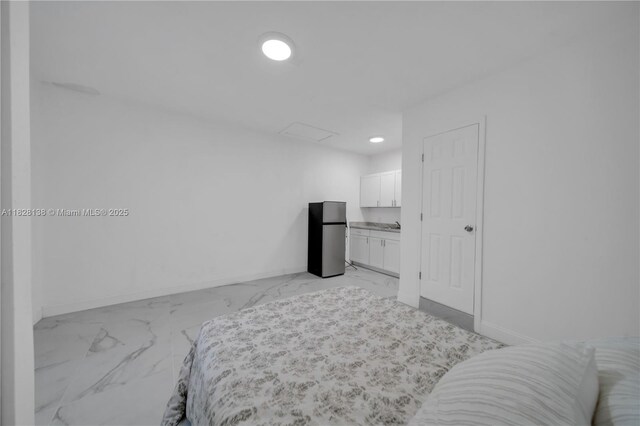 14795 SW 174th St, Miami, FL 33187 - bedroom featuring freestanding refrigerator, light marble finish flooring, and recessed lighting