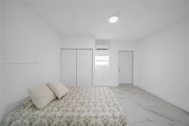 14795 SW 174th St, Miami, FL 33187 - bedroom with an AC wall unit, marble look tile flooring, and a closet