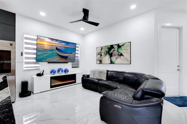1550 SW 89th Ct, Miami, FL 33174 - living area featuring a ceiling fan, a glass covered fireplace, recessed lighting, and light marble finish flooring