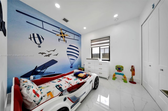 1550 SW 89th Ct, Miami, FL 33174 - bedroom with light marble finish floors, recessed lighting, and a closet