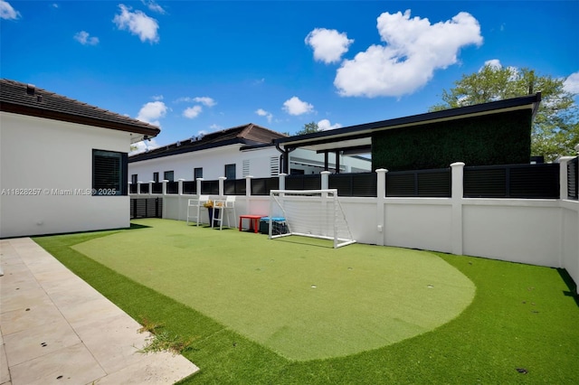 1550 SW 89th Ct, Miami, FL 33174 - view of yard featuring a putting green