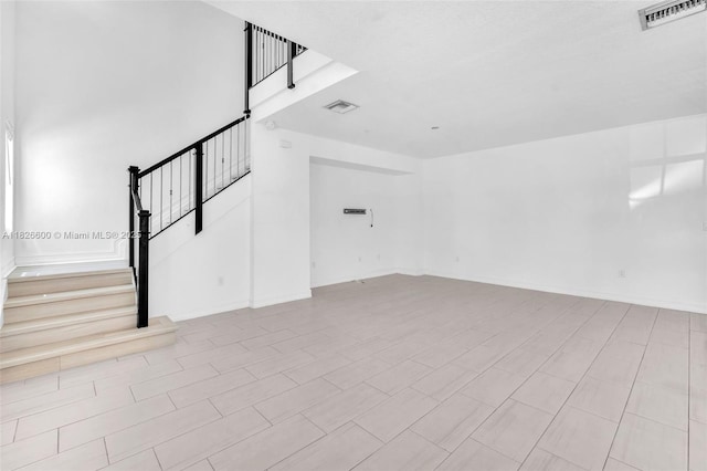 11735 SW 13th Ct, Pembroke Pines, FL 33025 - unfurnished living room with stairway and baseboards