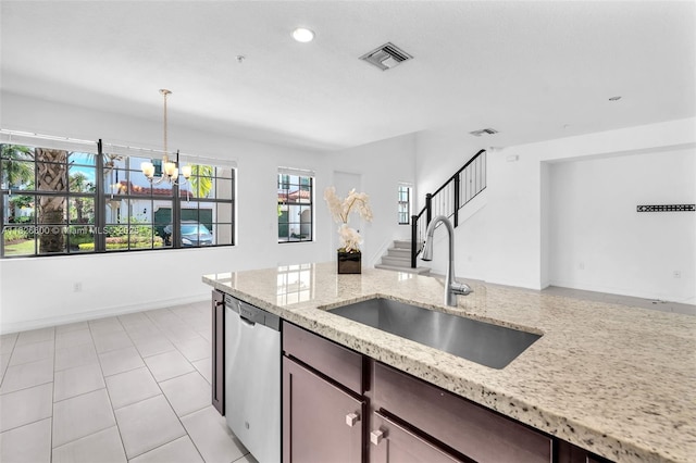 11735 SW 13th Ct, Pembroke Pines, FL 33025 - kitchen featuring stainless steel dishwasher, a chandelier, decorative light fixtures, light stone countertops, and recessed lighting