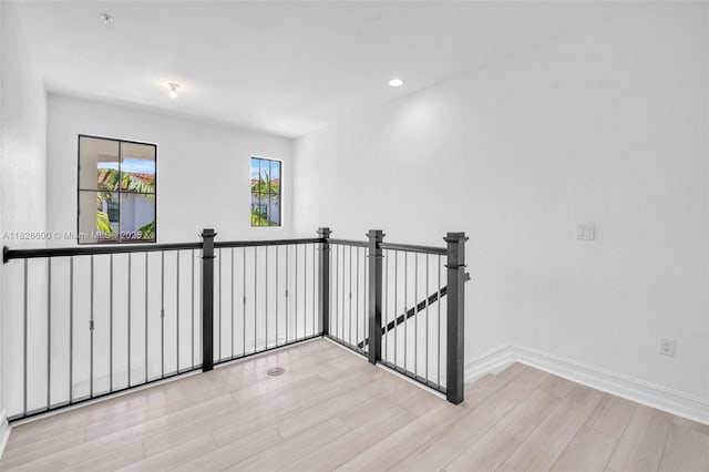 11735 SW 13th Ct, Pembroke Pines, FL 33025 - corridor featuring light wood-style floors, an upstairs landing, and recessed lighting