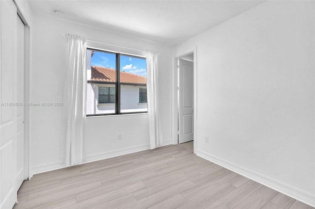 11735 SW 13th Ct, Pembroke Pines, FL 33025 - unfurnished bedroom featuring light wood-type flooring and a closet