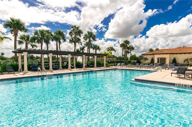 11735 SW 13th Ct, Pembroke Pines, FL 33025 - community pool with a pergola and a patio area