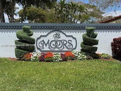 6298 NW 170th Ln, Hialeah, FL 33015 - community sign with a lawn
