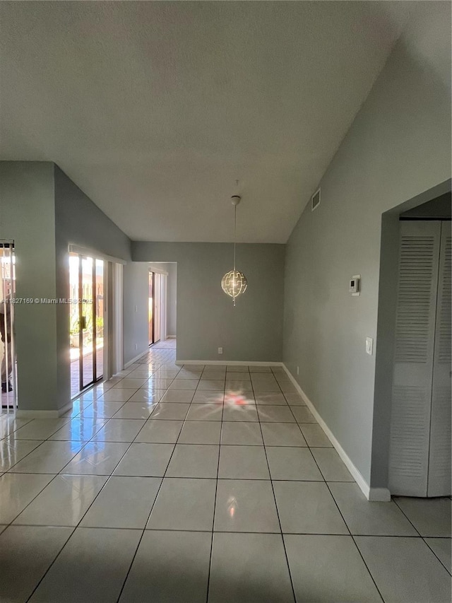 6298 NW 170th Ln, Hialeah, FL 33015 - unfurnished room with light tile patterned floors and a textured ceiling