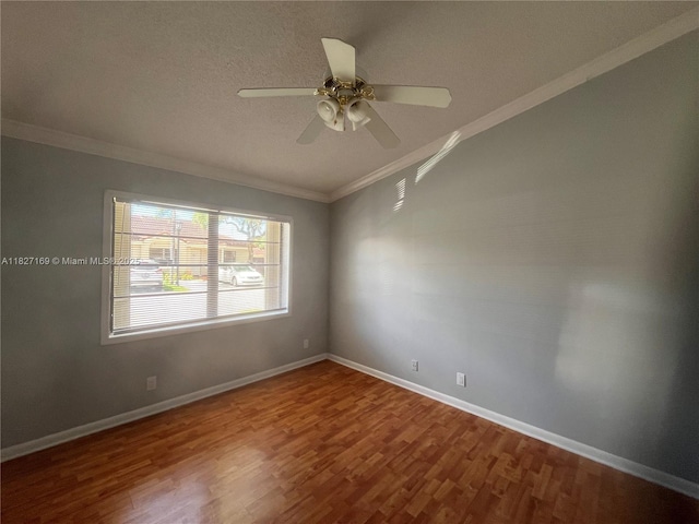 6298 NW 170th Ln, Hialeah, FL 33015 - unfurnished room featuring crown molding, wood finished floors, ceiling fan, a textured ceiling, and vaulted ceiling