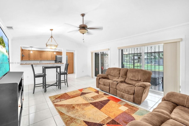 1621 NW 96th Ter, Pembroke Pines, FL 33024 - living room featuring light tile patterned flooring, vaulted ceiling, ceiling fan, and crown molding