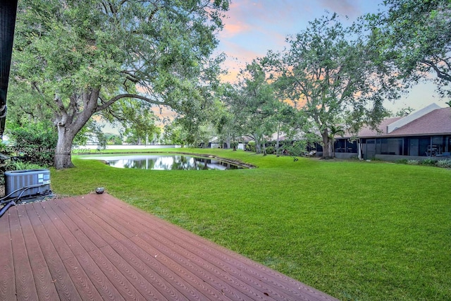 1621 NW 96th Ter, Pembroke Pines, FL 33024 - deck with a water view and a yard