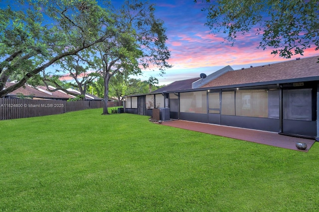 1621 NW 96th Ter, Pembroke Pines, FL 33024 - yard at dusk with a sunroom