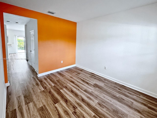 6011 W Paso Fino Pl, Davie, FL 33314 - unfurnished room with baseboards and wood finished floors