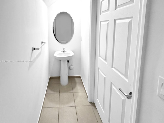 6011 W Paso Fino Pl, Davie, FL 33314 - bathroom with tile patterned floors and baseboards