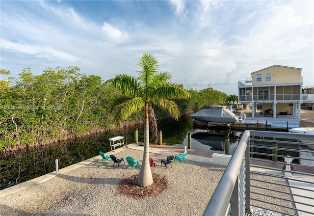 475 Bahia Honda Rd, Key Largo, FL 33037 - view of patio featuring a dock and boat lift