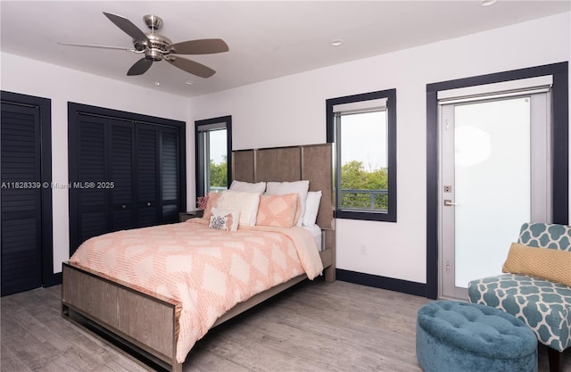 475 Bahia Honda Rd, Key Largo, FL 33037 - bedroom featuring light wood-style floors, two closets, recessed lighting, and ceiling fan
