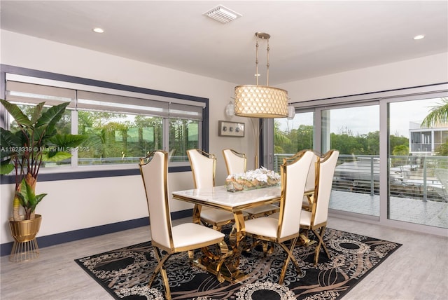 475 Bahia Honda Rd, Key Largo, FL 33037 - dining space featuring wood finished floors and recessed lighting