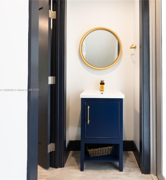 475 Bahia Honda Rd, Key Largo, FL 33037 - bathroom featuring wood finished floors and vanity