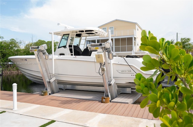 475 Bahia Honda Rd, Key Largo, FL 33037 - dock featuring boat lift and a water view
