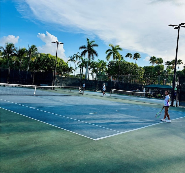 9725NW NW 52nd St Unit 415, Doral, FL 33178 - view of tennis court